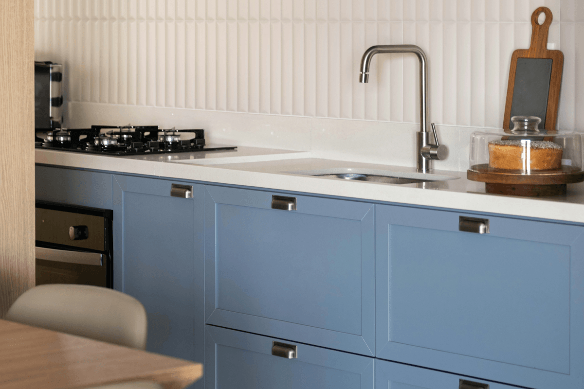 DWIL Cabinet and Furniture Paint shown with a cabinet refresh scene