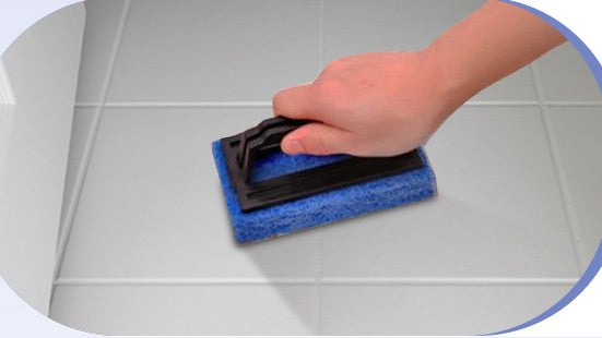 Scrubbing tile with DWIL Tile and Ceramic Cleaner