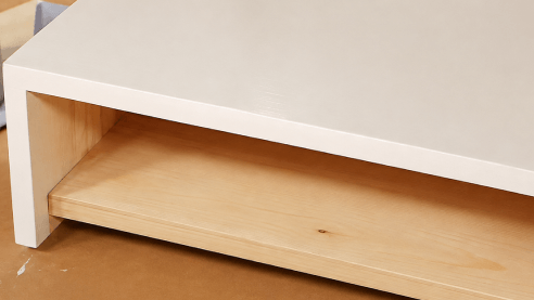 Refinished wood furniture drying after painting